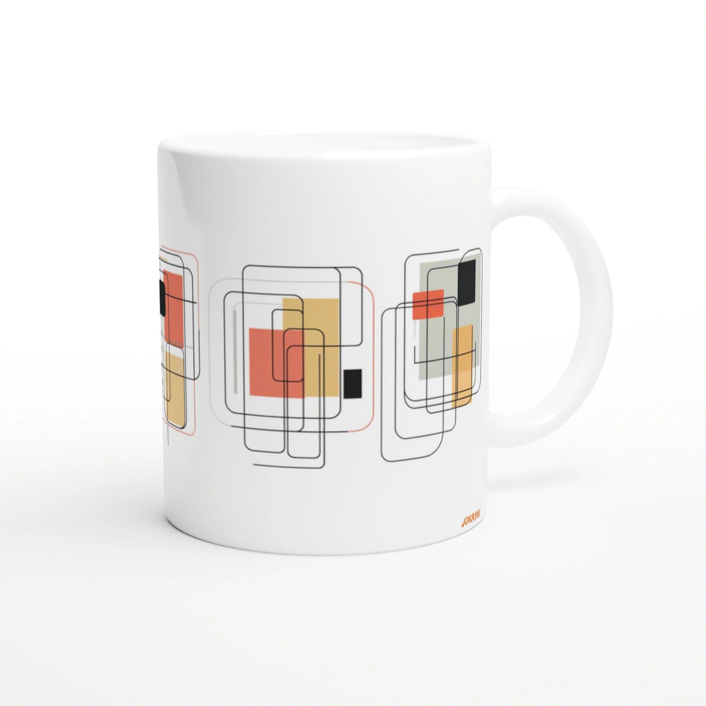 White ceramic mug with an abstract geometric pattern of overlapping rounded-square outlines in black and blocks of orange, yellow, and gray.