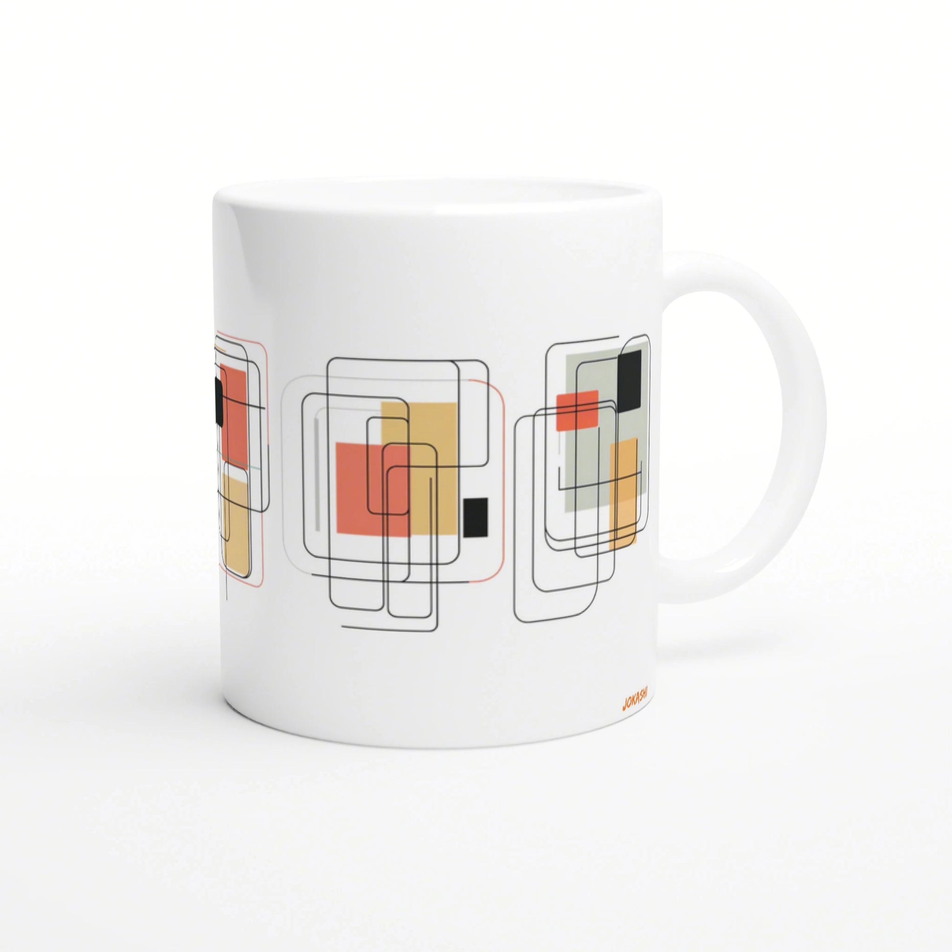 White ceramic mug with an abstract geometric pattern of overlapping rounded-square outlines in black and blocks of orange, yellow, and gray.