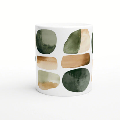 White mug featuring abstract green and beige watercolor shapes.