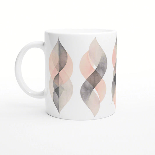 White ceramic mug mockup featuring an abstract pattern of overlapping peach, pink, and gray leaf shapes around the side.