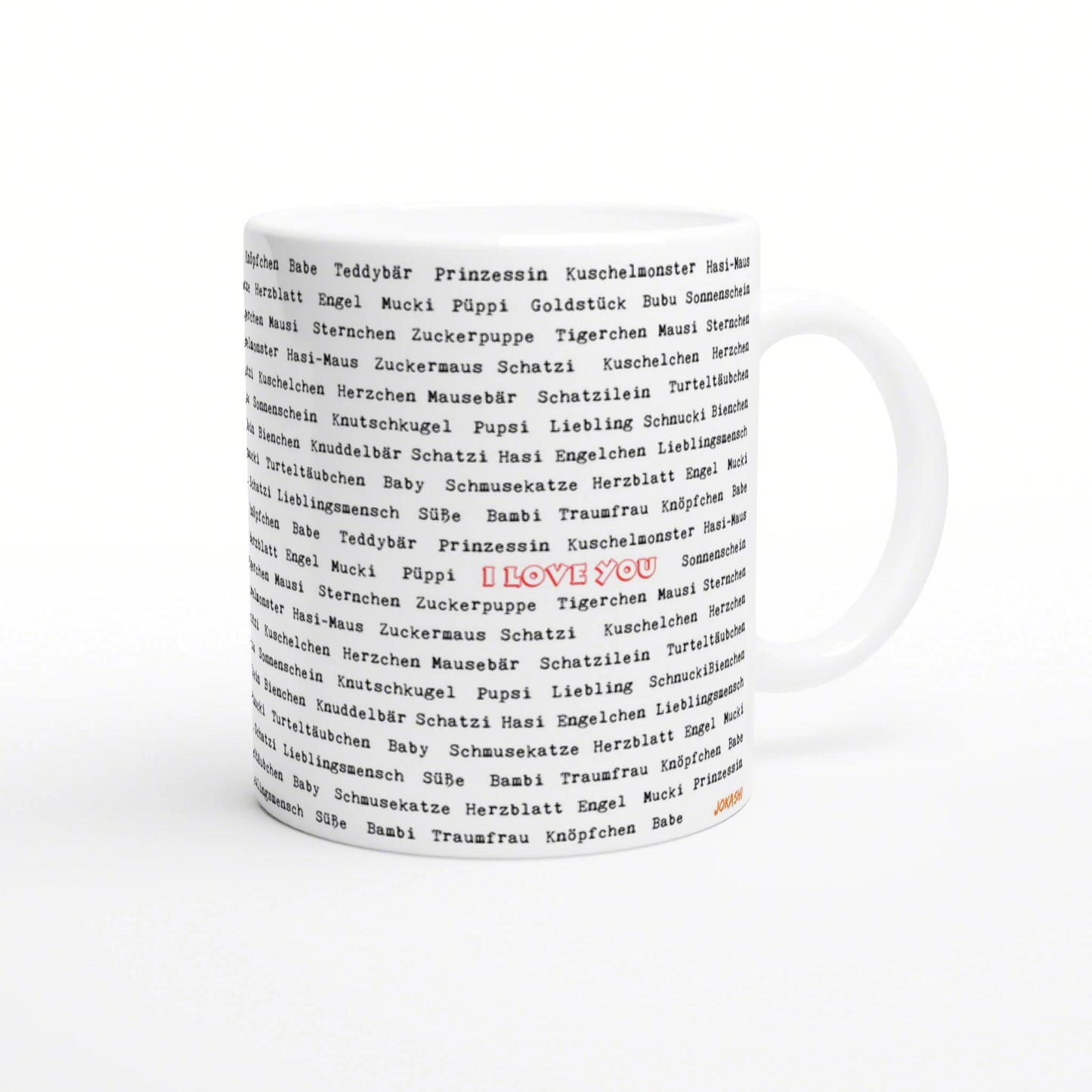 White ceramic mug with an all-over print of black German words; a red 'I LOVE YOU' stands out in the center.