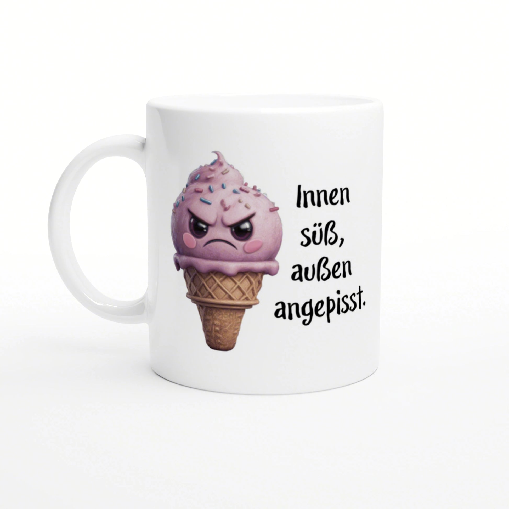 White mug featuring a pink, angry ice-cream cone with sprinkles and the German caption 'Innen süß, außen angepisst'.