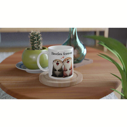 White mug mockup featuring two smiling cartoon animals and the text Besties forever on a wooden coaster with plants around.