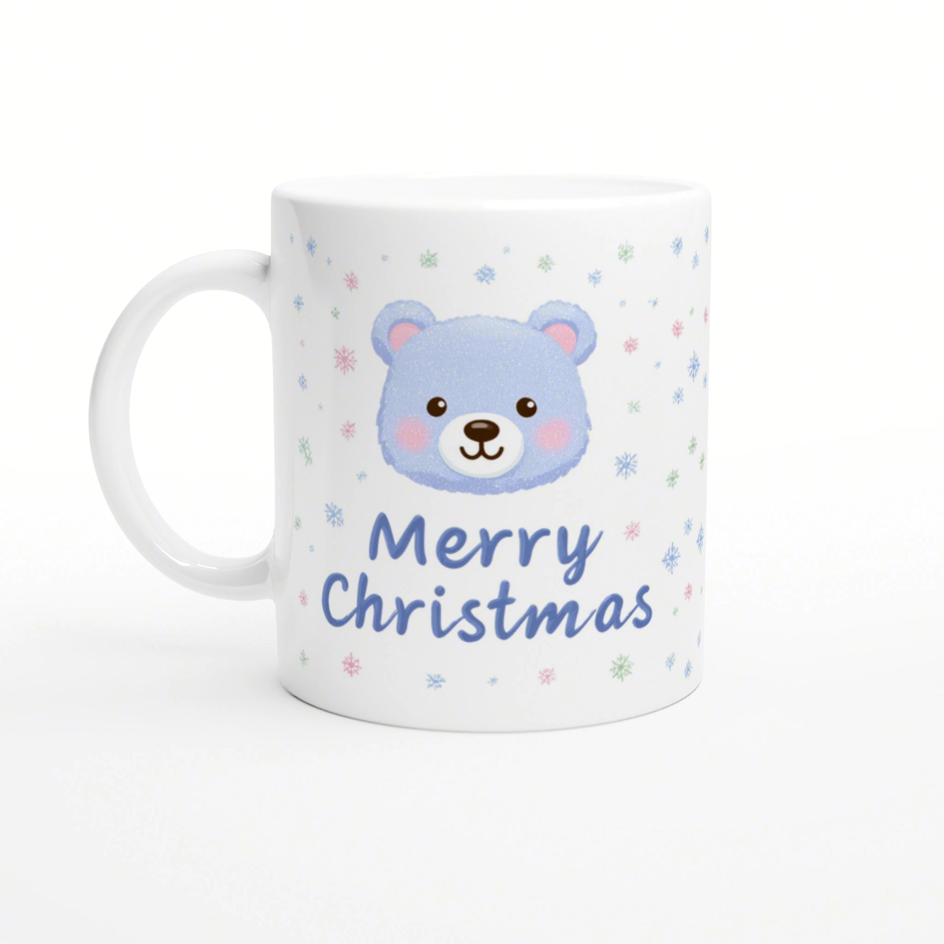 White mug featuring a blue bear face, pastel snowflakes, and the text 'Merry Christmas' in blue script.