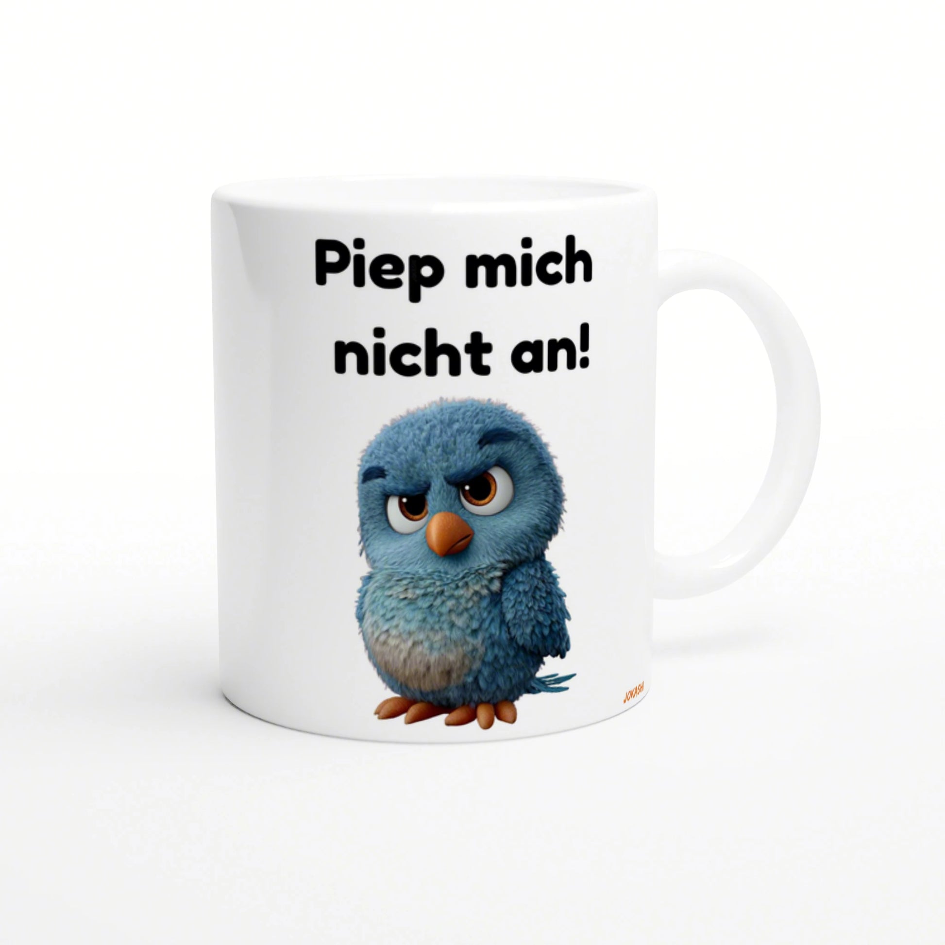 White ceramic mug mockup featuring a blue fluffy cartoon chick and bold German text 'Piep mich nicht an!'