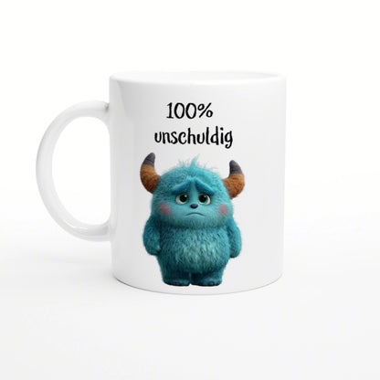 White mug featuring a blue fluffy monster with horns and the text 100% unschuldig.