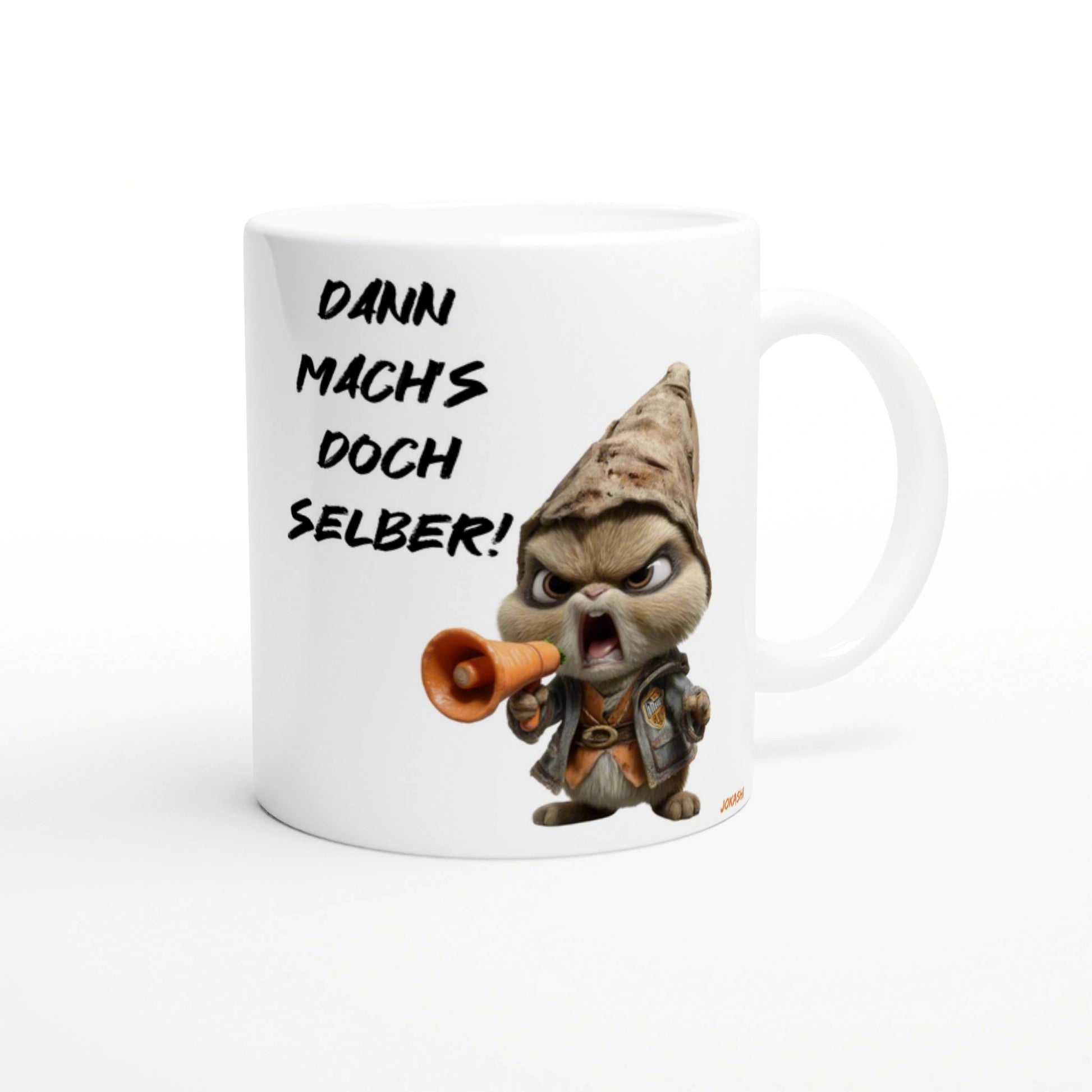 White mug featuring a grumpy hooded cartoon character shouting into a megaphone and the German text Dann mach's doch selber!