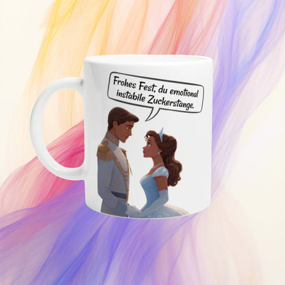 White mug mockup with cartoon couple in formal wear, speech bubble reads: 'Frohes Fest, du emotional instabile Zuckerstange.'