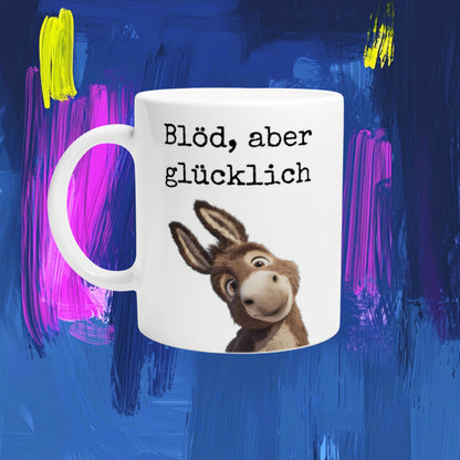 White mug with a cartoon donkey and a German slogan on a colorful abstract background; product mockup for online shop.