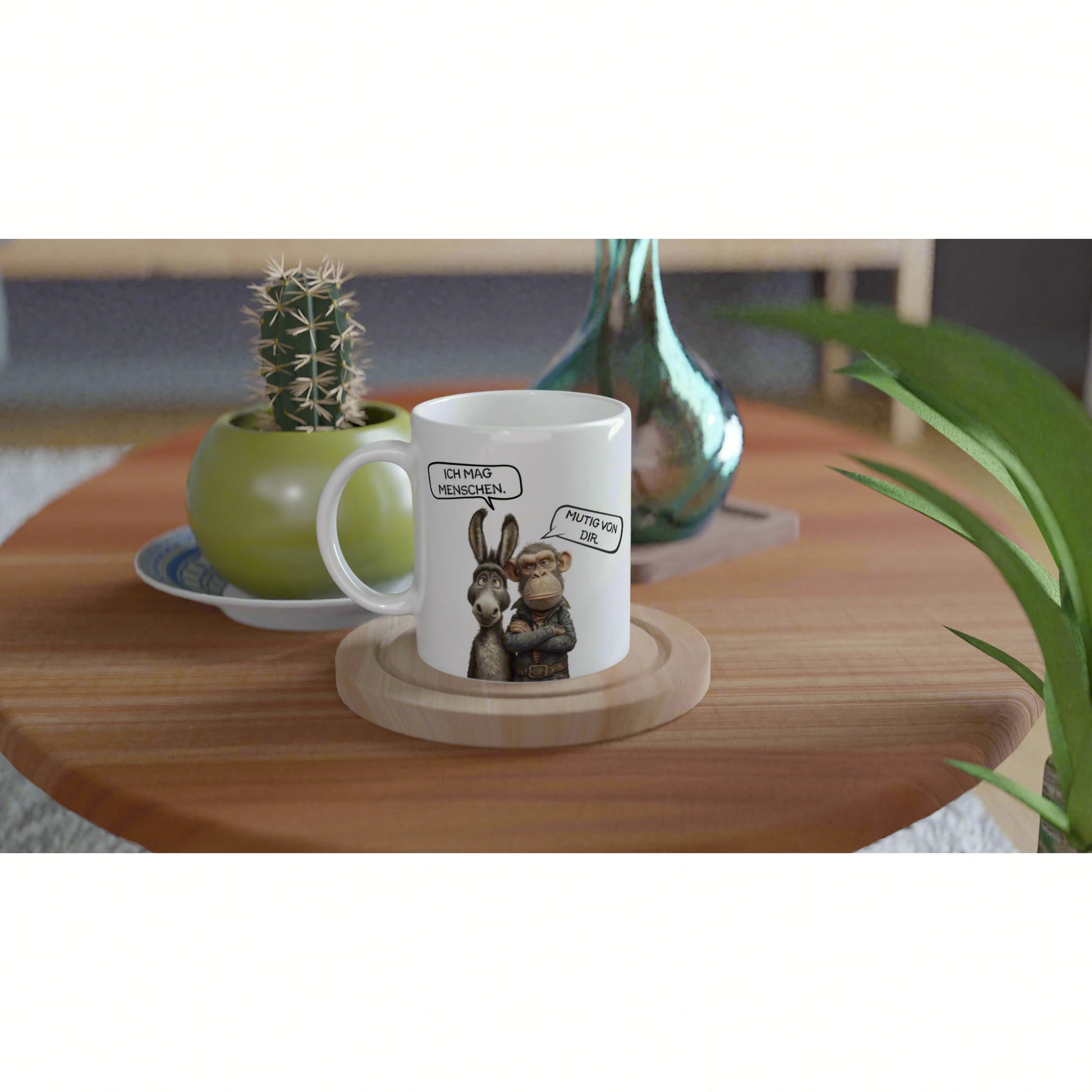 Product mockup: white mug with cartoon donkey and monkey and speech bubbles, on a wooden coaster beside plants.