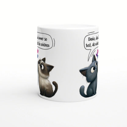 White ceramic mug with two cartoon kittens on the sides, each with a speech bubble of German text; playful product mockup.