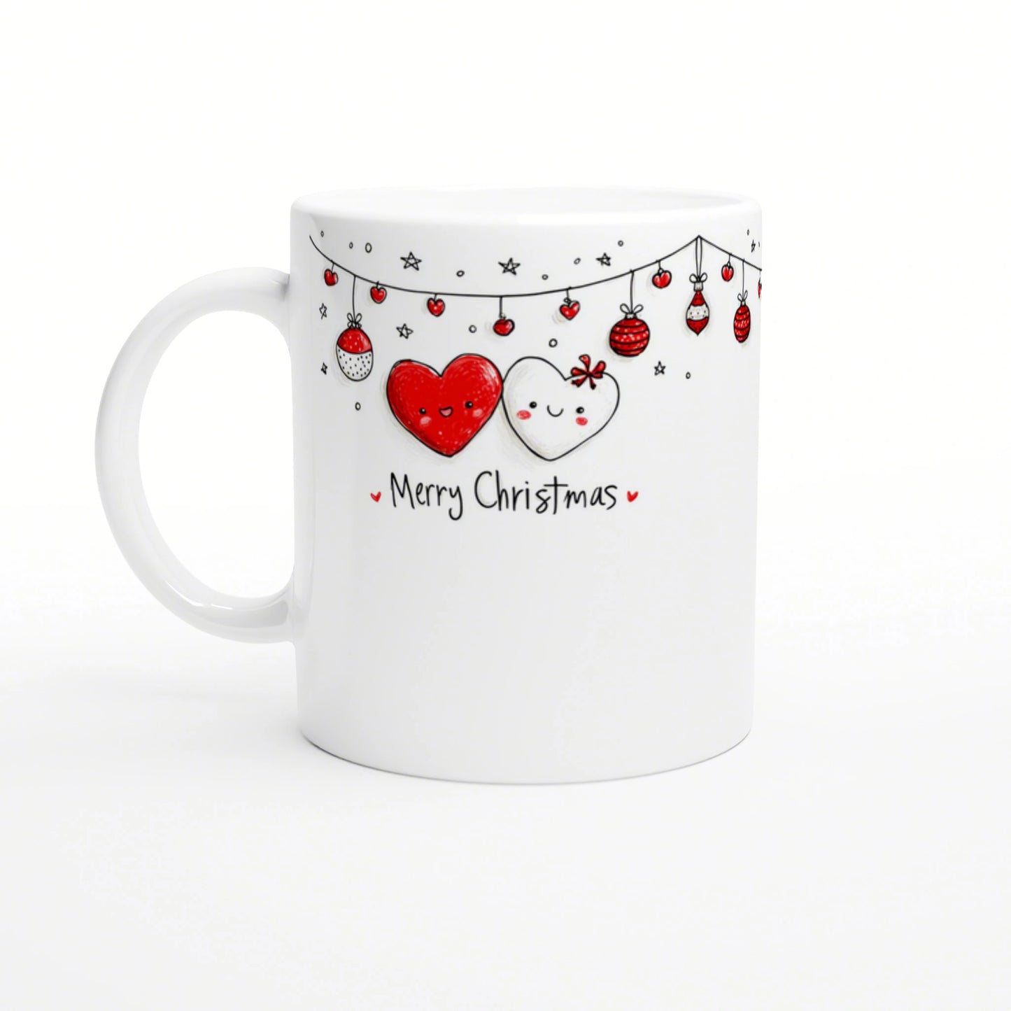 White mug with Christmas design: two smiling hearts, hanging ornaments, and 'Merry Christmas' text.