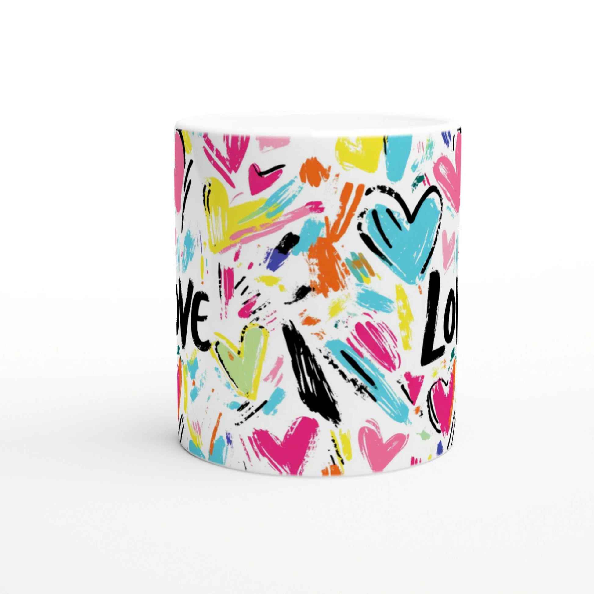 White mug featuring a vibrant, abstract pattern of colorful hearts and brush-stroke marks, with the word LOVE in black.