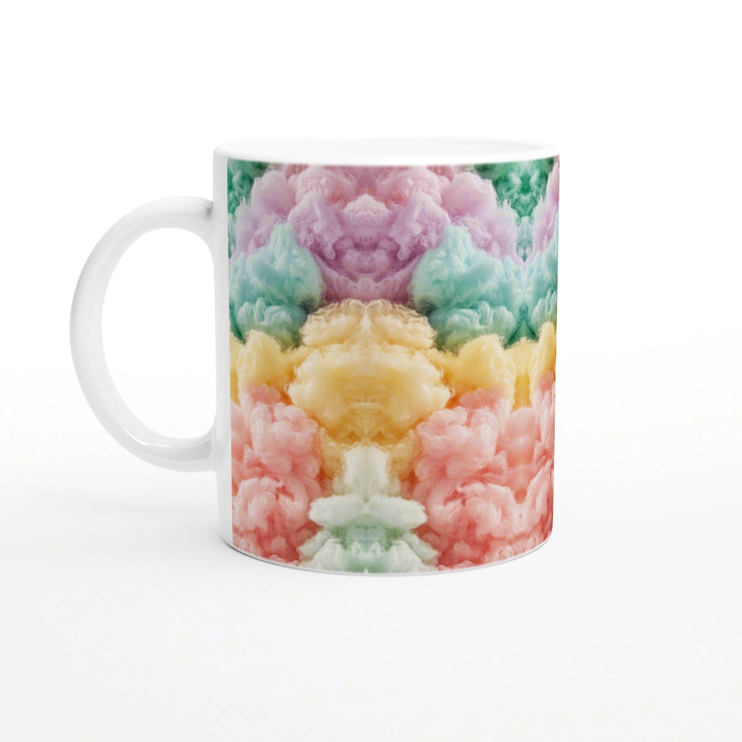 White ceramic mug wrapped in a vibrant kaleidoscopic pattern of pink, yellow, green, and teal cloud-like shapes.