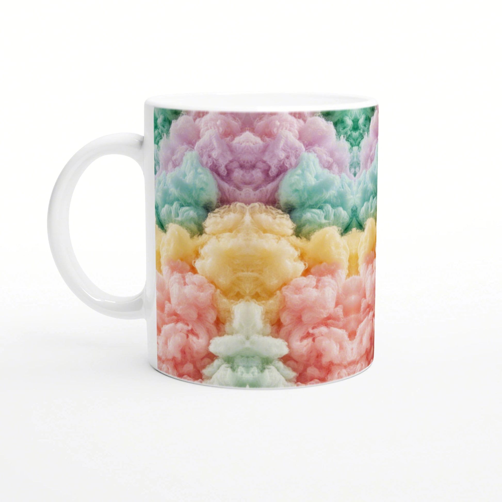 White ceramic mug wrapped in a vibrant kaleidoscopic pattern of pink, yellow, green, and teal cloud-like shapes.