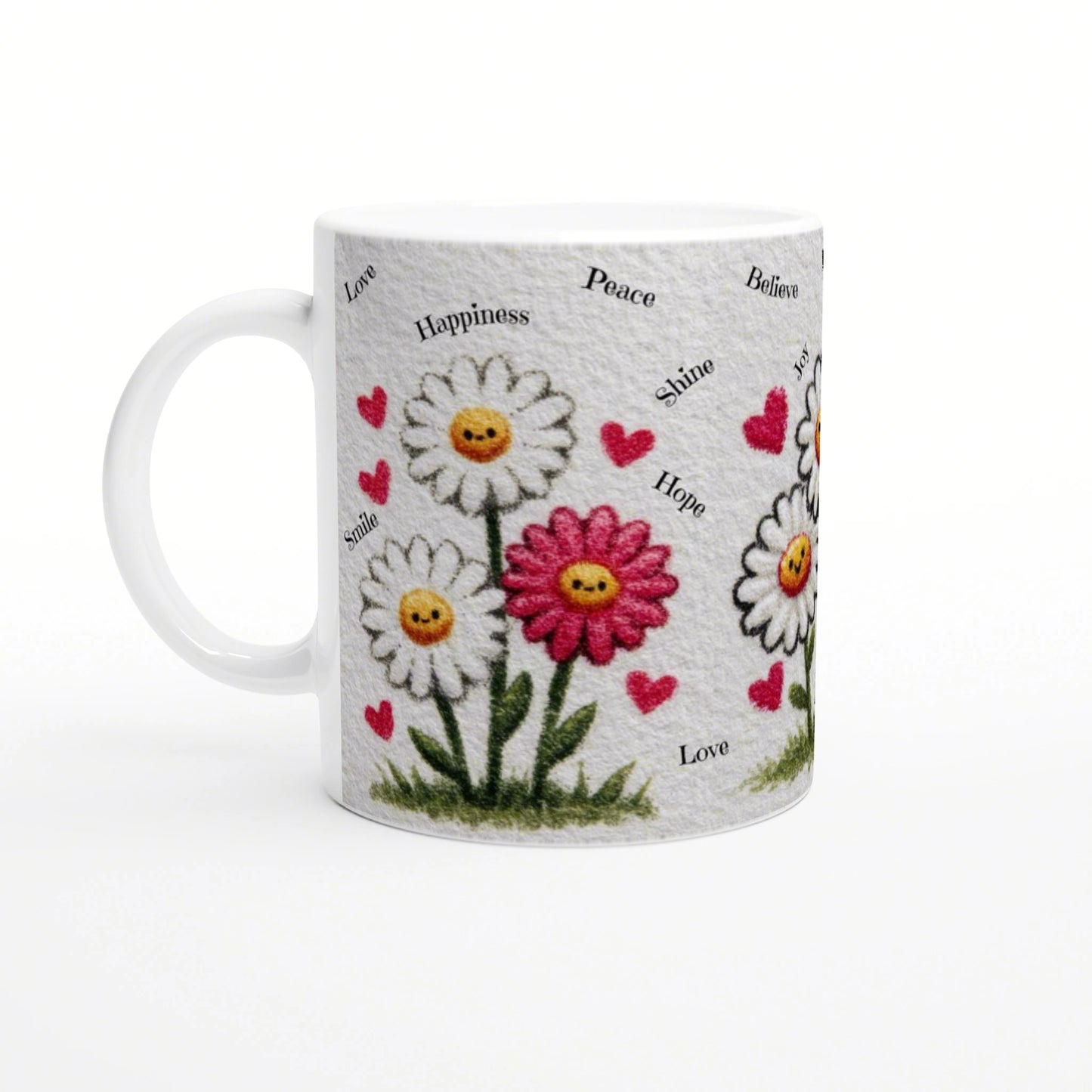 White mug with daisies, yellow smiley centers, pink hearts, and words like Love, Happiness, Peace.
