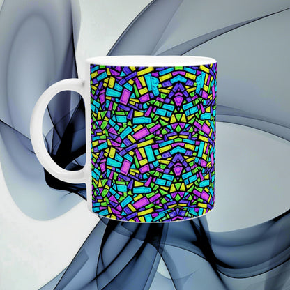 White ceramic mug with a dense multicolor mosaic of small rectangular shapes, shown as a product mockup.