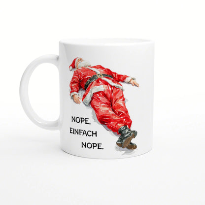 White ceramic mug featuring a fallen Santa in a red suit and the caption 'NOPE. EINFACH NOPE'.