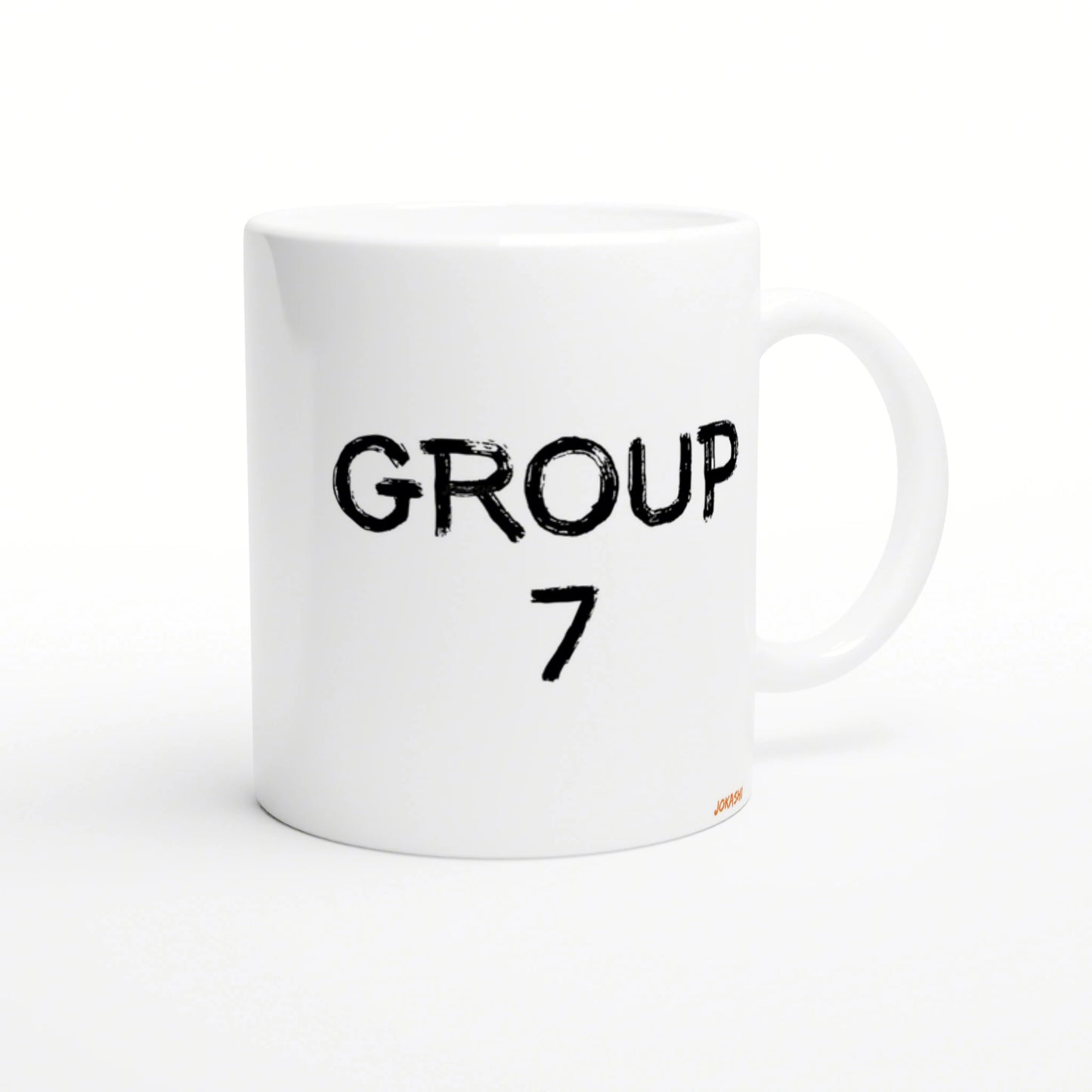 White ceramic mug with bold distressed black text GROUP 7 on the front; product mockup for a novelty mug.