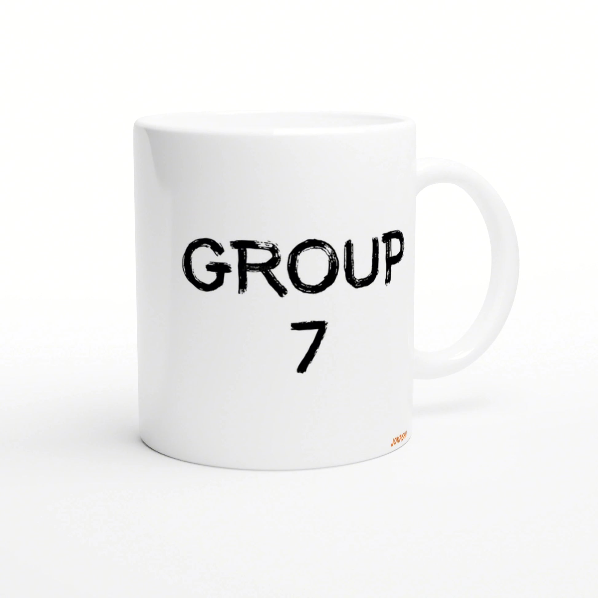White ceramic mug with bold distressed black text GROUP 7 on the front; product mockup for a novelty mug.