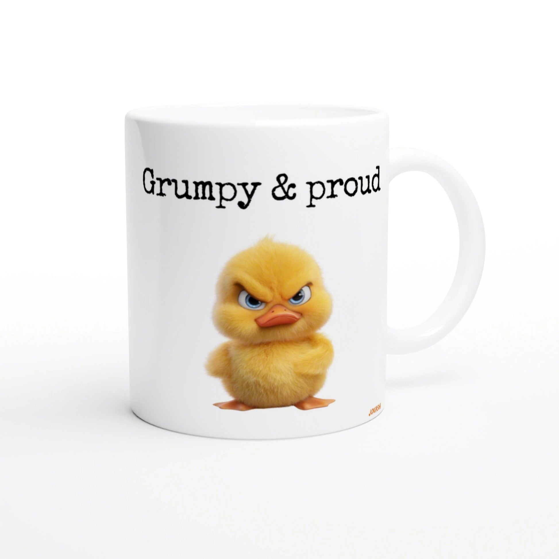 White mug featuring a fluffy yellow duckling with a grumpy expression and the caption 'Grumpy & proud'.