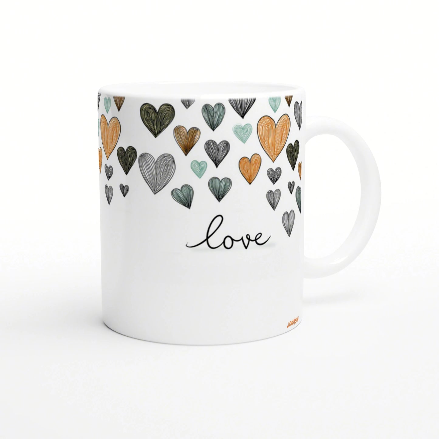 White mug with colorful hand-drawn hearts around the top and the word love in cursive, a product mockup for an online shop.