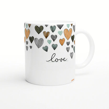 White mug with colorful hand-drawn hearts around the top and the word love in cursive, a product mockup for an online shop.