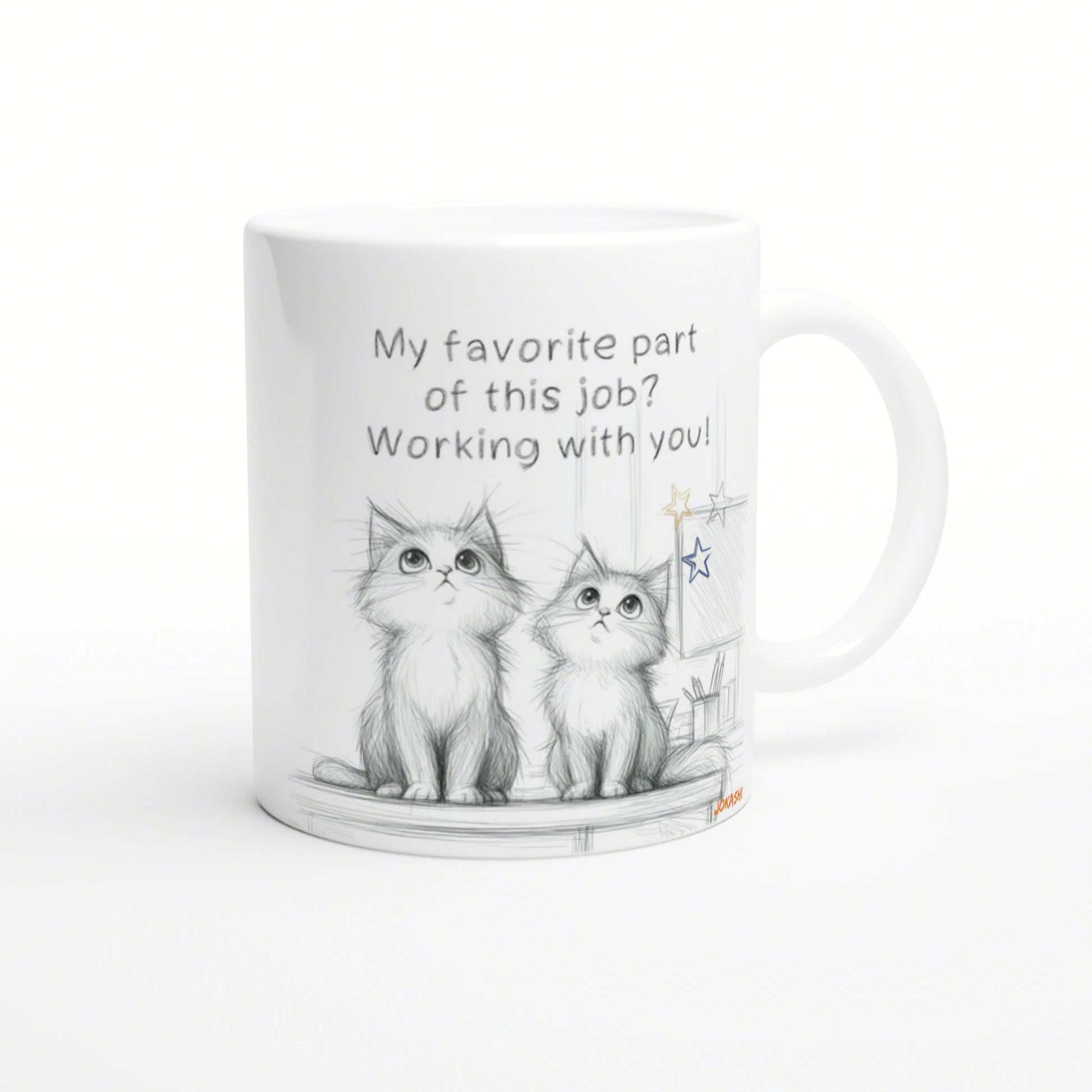 White mug featuring a pencil sketch of two kittens and the caption 'My favorite part of this job? Working with you!'