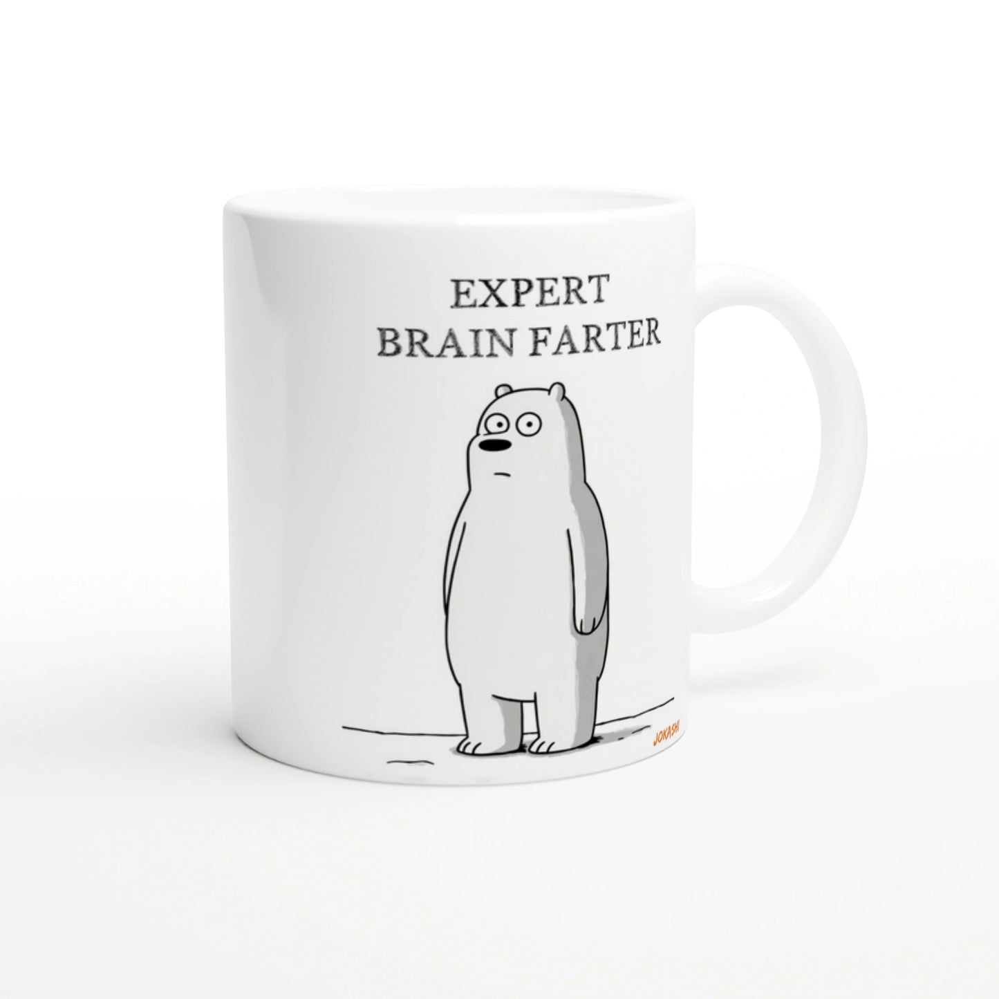 White ceramic mug mockup with a simple line-drawn bear and the caption 'EXPERT BRAIN FARTER'.