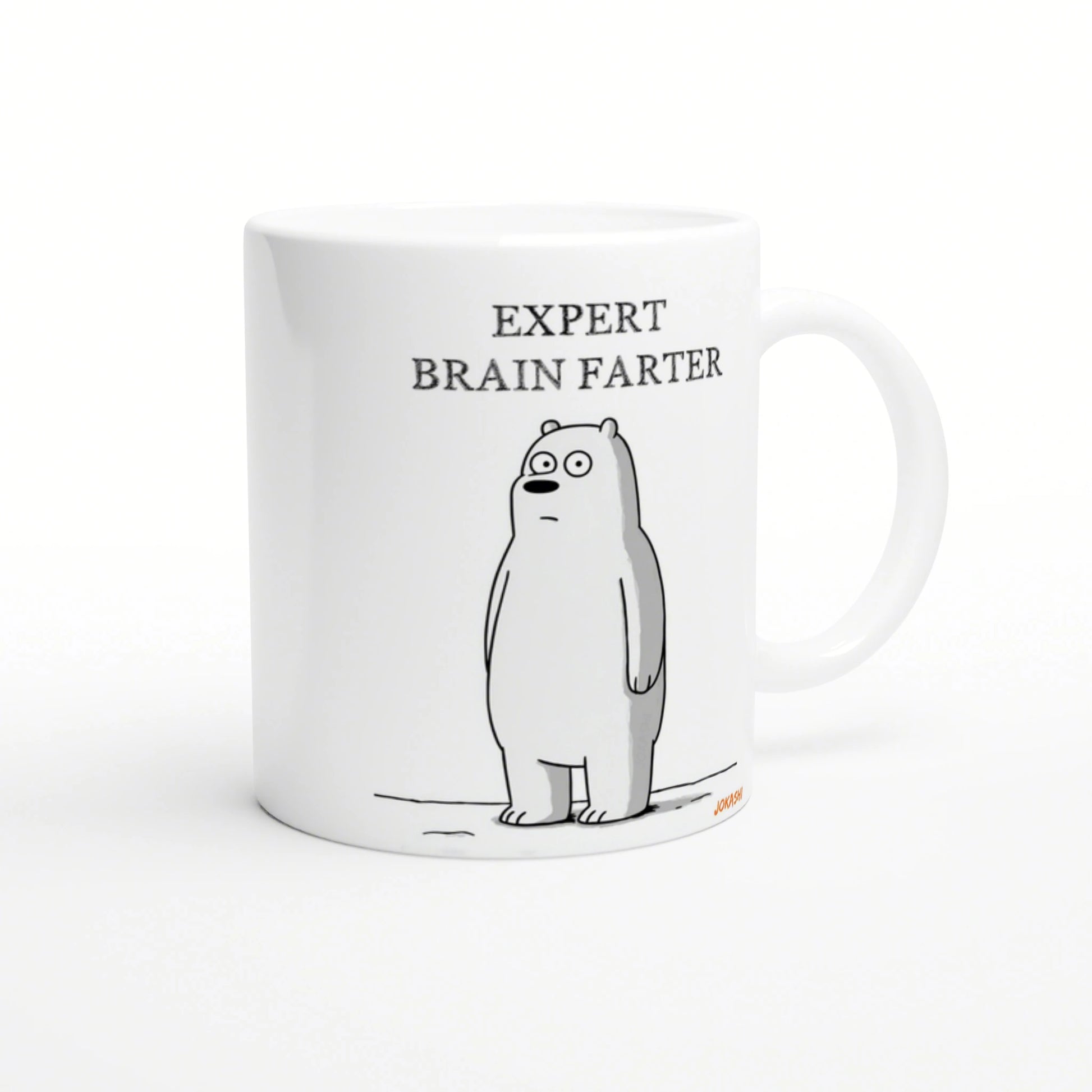 White ceramic mug mockup with a simple line-drawn bear and the caption 'EXPERT BRAIN FARTER'.