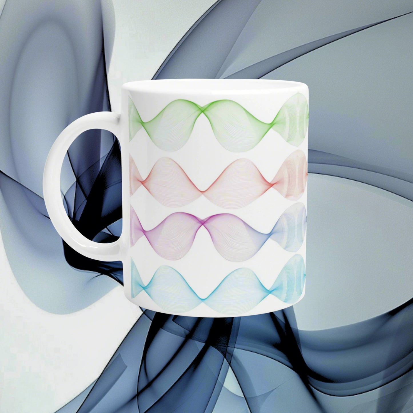 White mug mockup featuring four colorful, wavy bands in green, pink, purple and blue around its side; abstract blue background.
