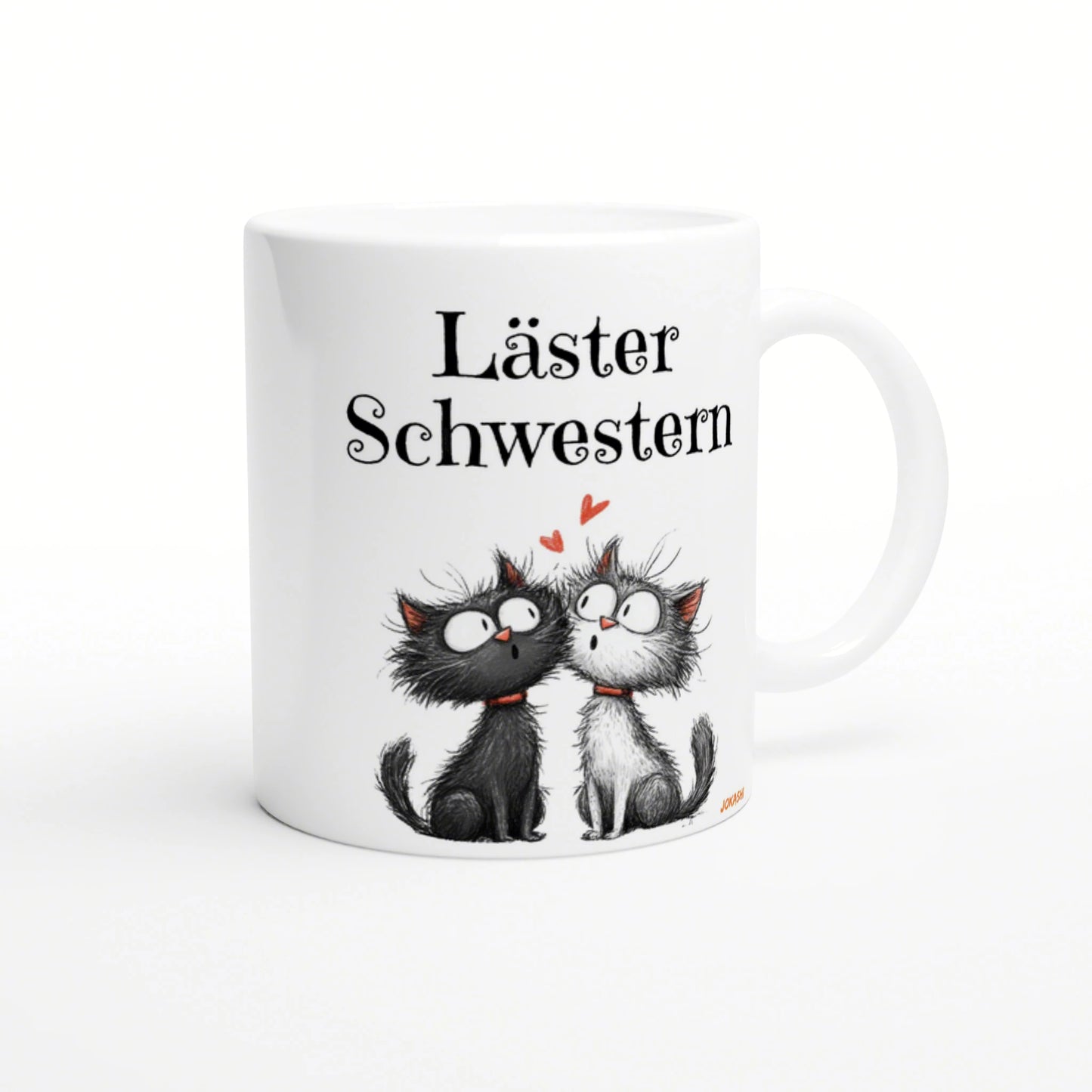 White mug mockup featuring two cartoon cats (black and white), red hearts, and the German phrase Läster Schwestern.