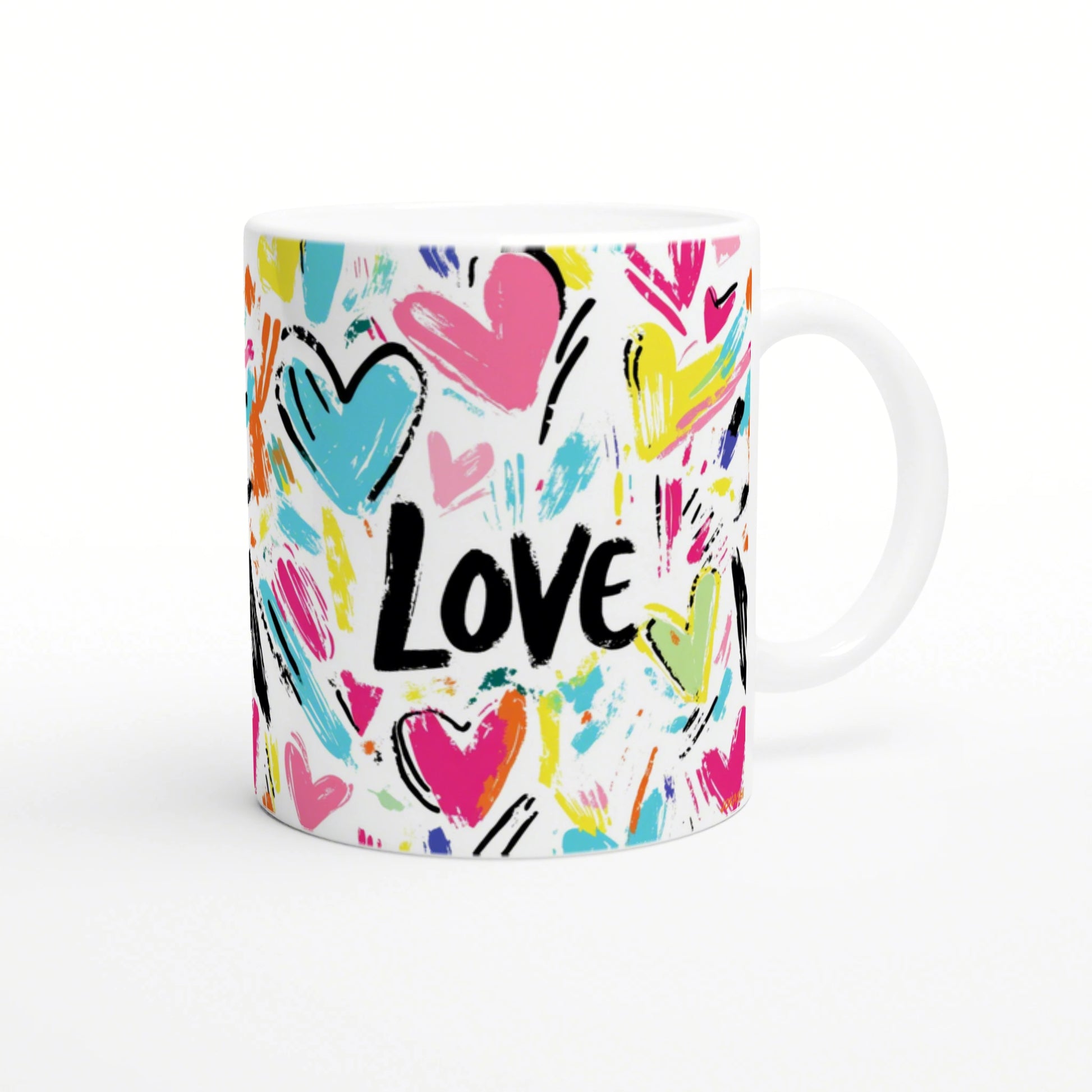 White ceramic mug mockup featuring multicolored brush-stroke hearts and the word Love in bold black letters.