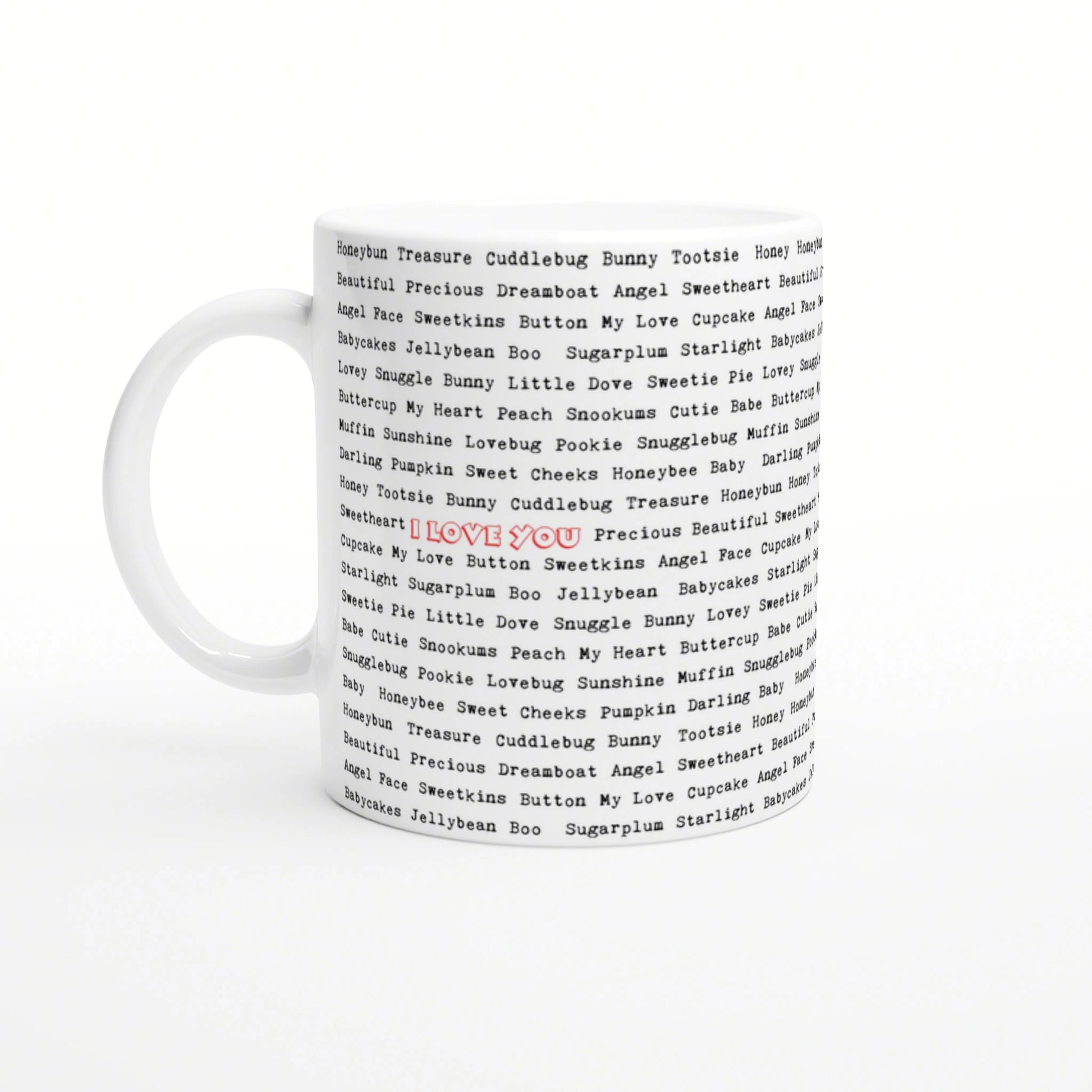 White ceramic mug mockup covered in repeating black nickname words; center shows red 'I LOVE YOU' text.