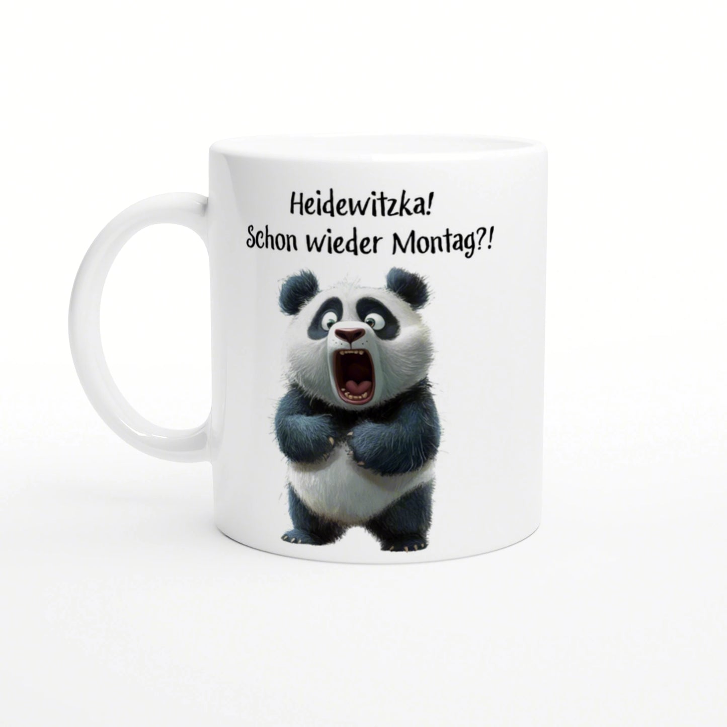 White mug mockup with a surprised panda and the German caption 'Heidewitzka! Schon wieder Montag?!'