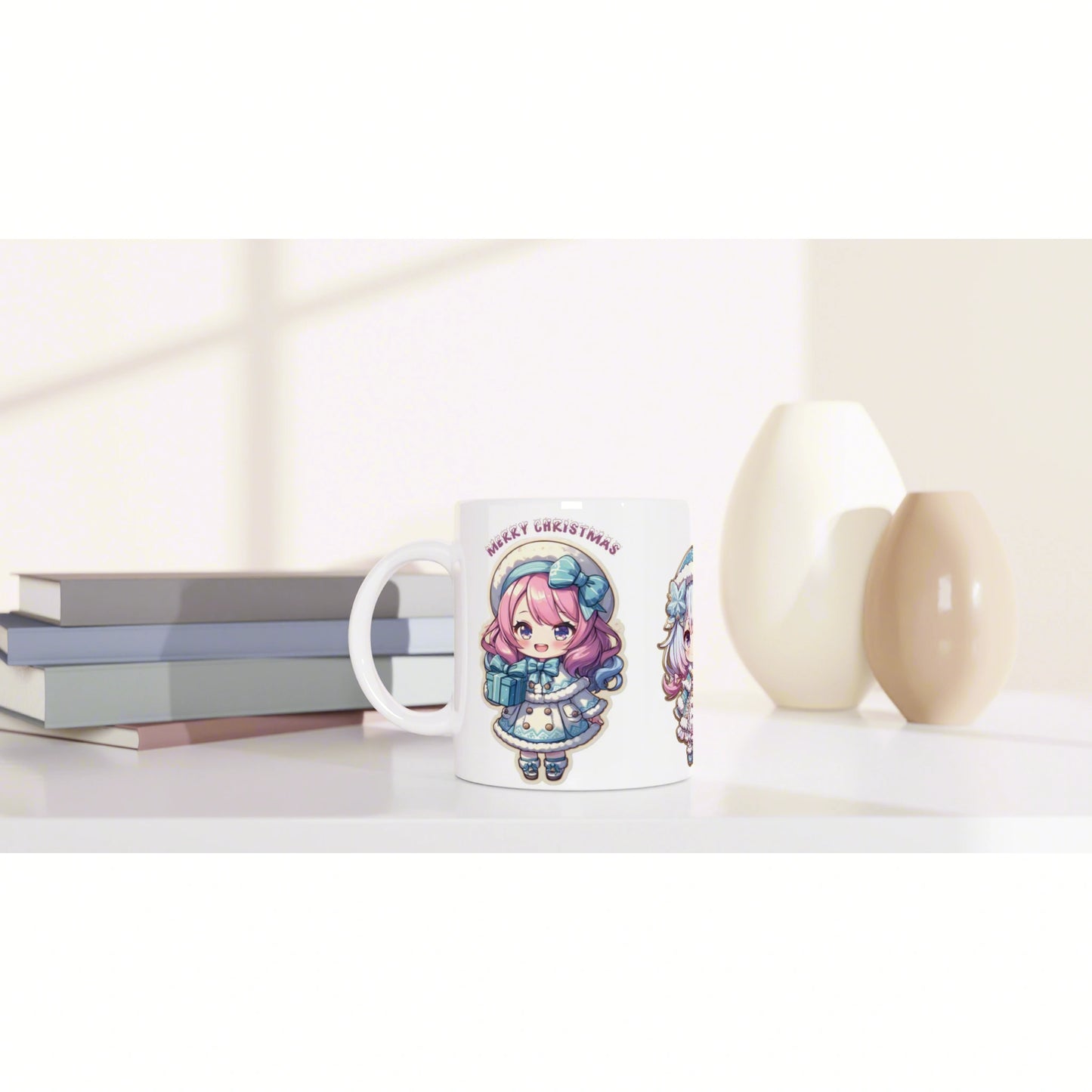 White mug with pastel anime girl illustration and Merry Christmas text, shown with books and decorative vases.