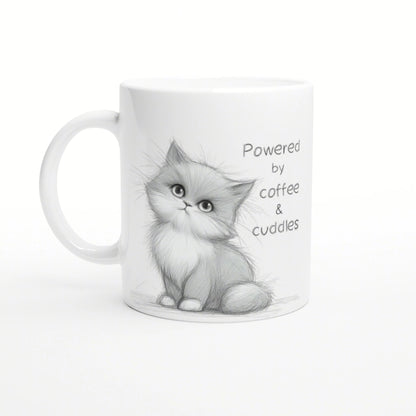 White mug with a cute pencil-drawn kitten and the caption 'Powered by coffee & cuddles'.