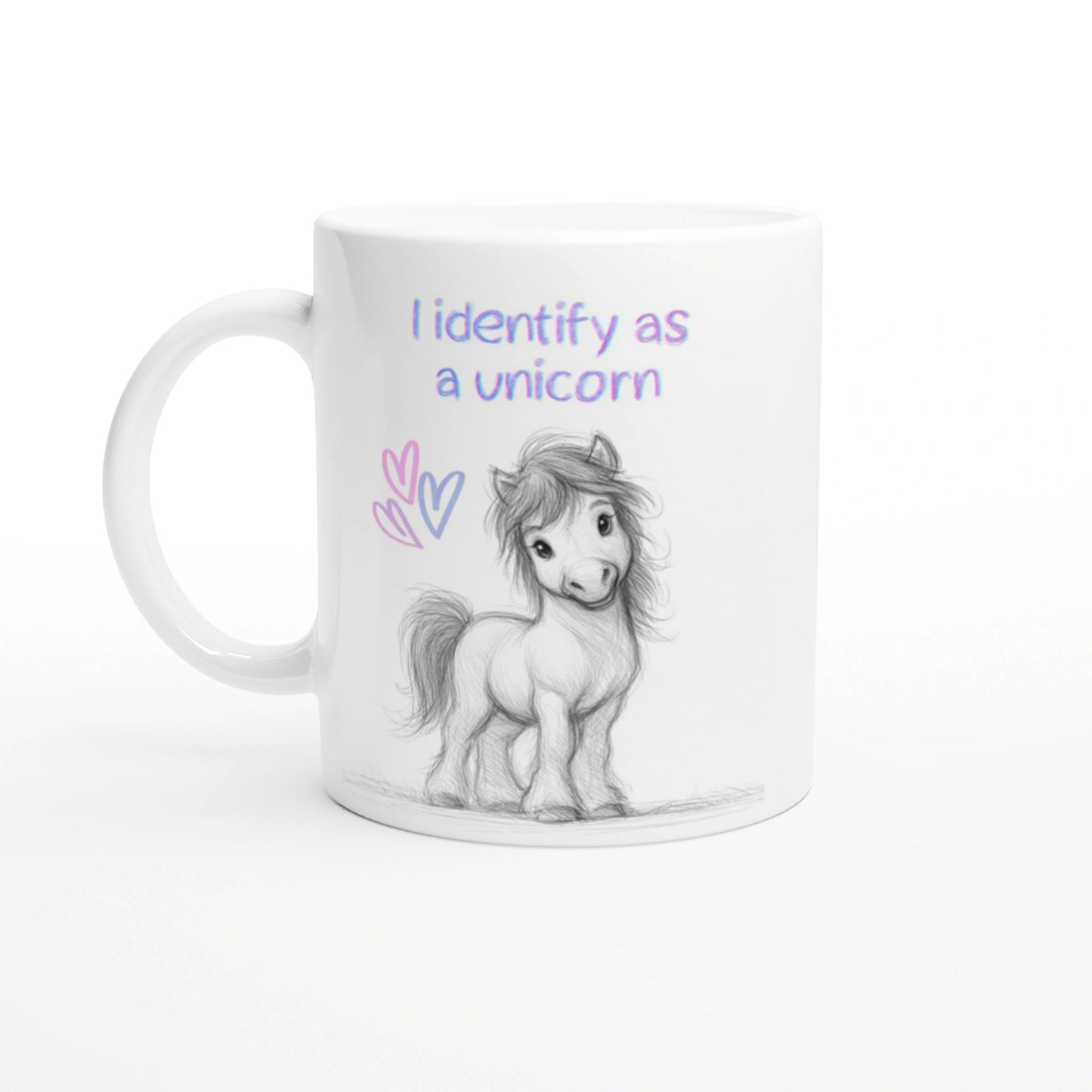 White mug mockup featuring a pencil-drawn pony, pastel hearts, and the slogan 'I identify as a unicorn'.