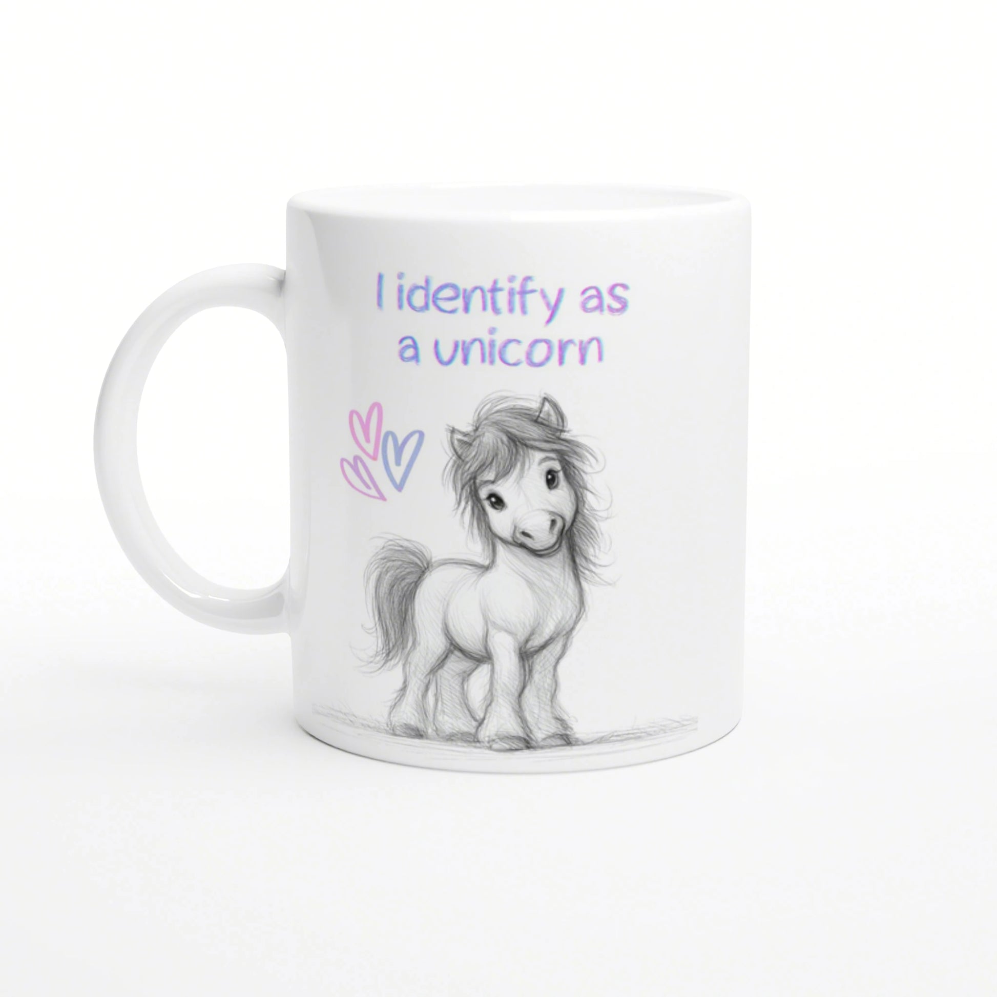White mug mockup featuring a pencil-drawn pony, pastel hearts, and the slogan 'I identify as a unicorn'.