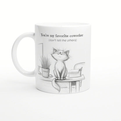 White mug with a pencil sketch of a cat on a desk, plant and books; You're my favorite coworker (don't tell the others).