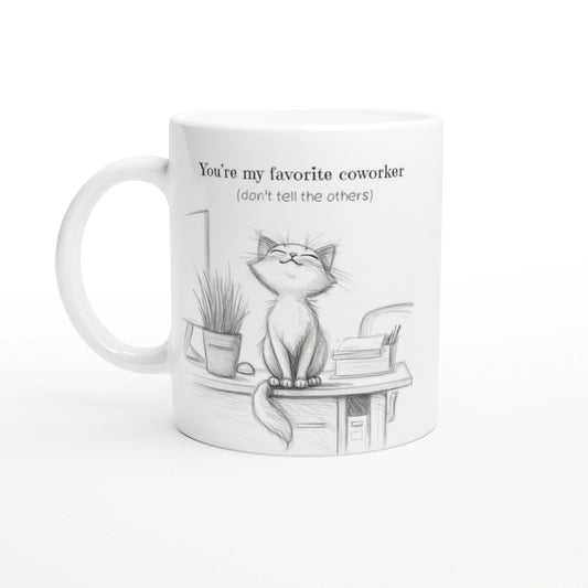 White mug with a pencil sketch of a cat on a desk, plant and books; You're my favorite coworker (don't tell the others).