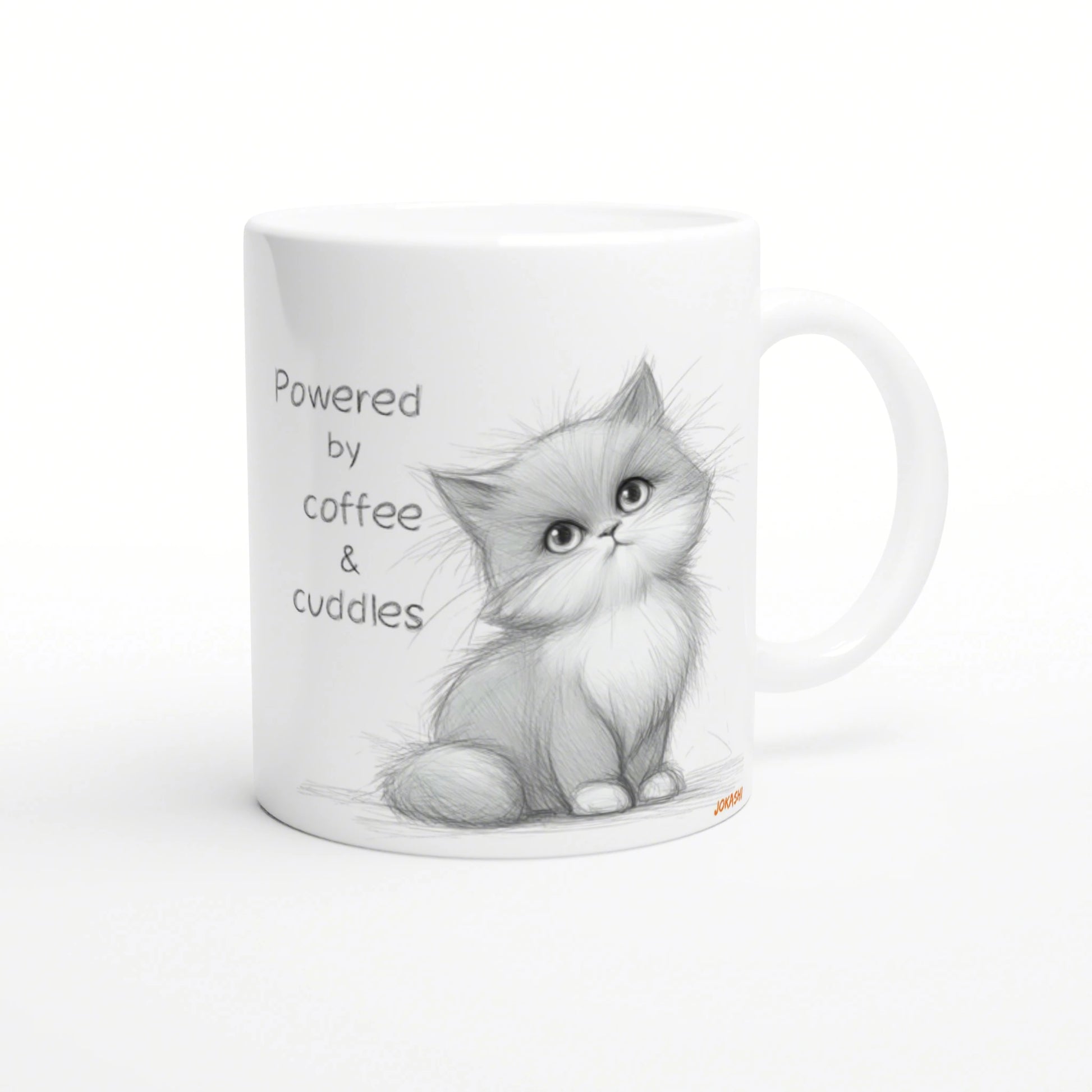 White ceramic mug featuring a pencil-sketch kitten and the caption 'Powered by coffee & cuddles'.