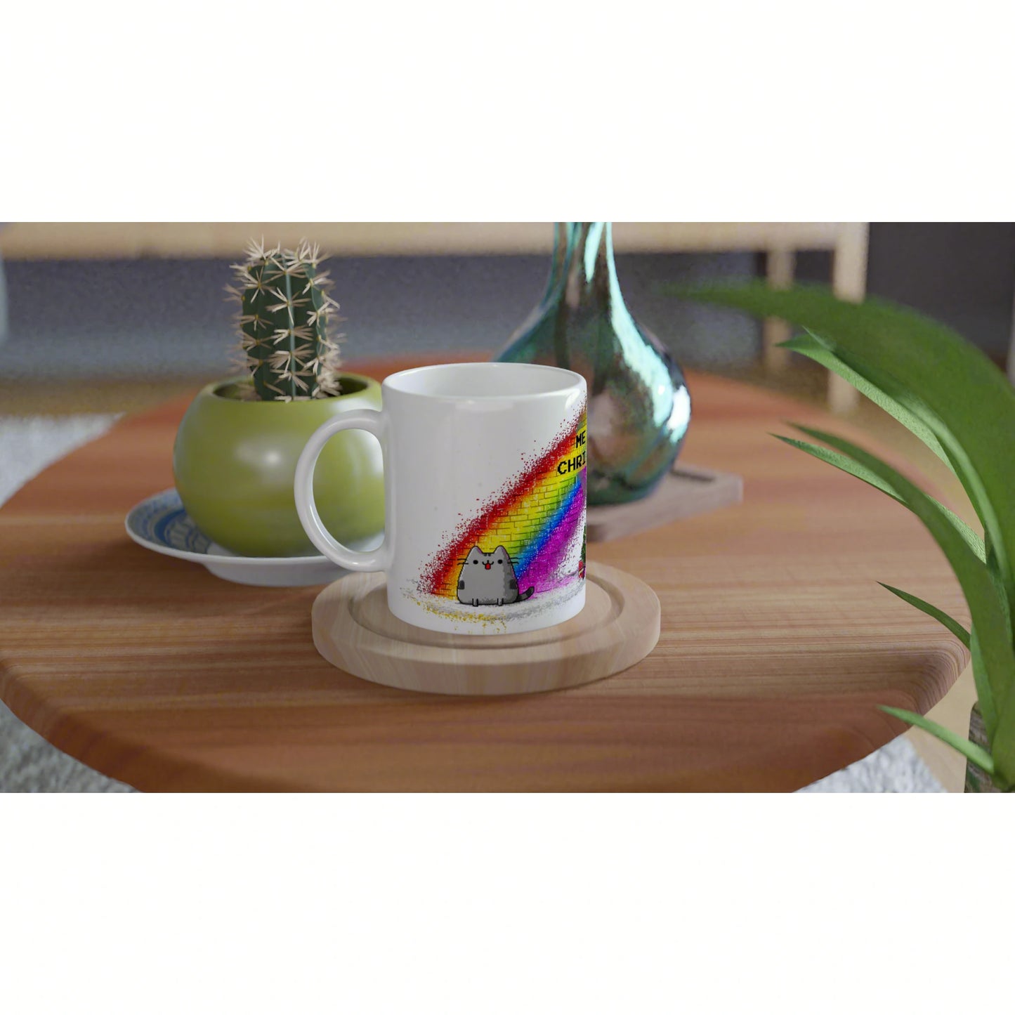 White ceramic mug featuring a rainbow splash and a tiny cartoon cat, displayed as a product mockup on a wooden table.