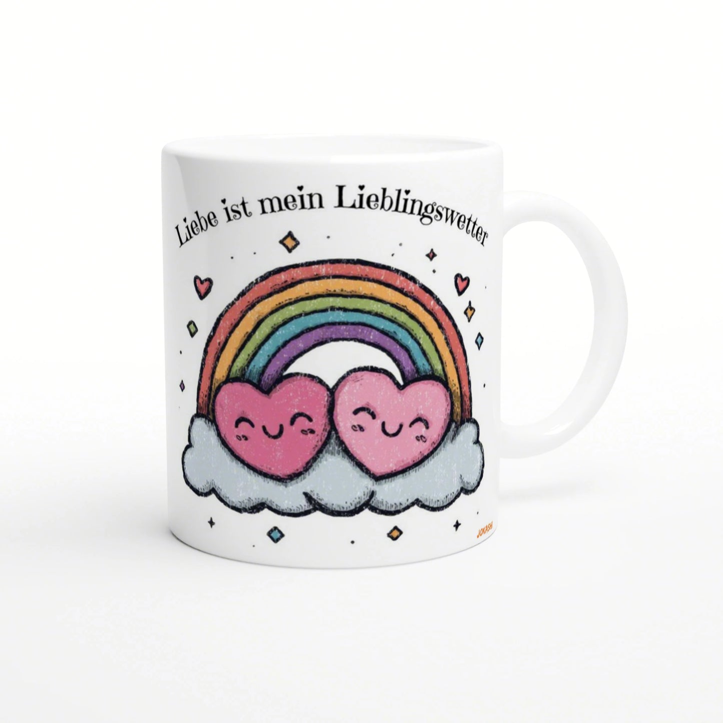 White mug featuring a rainbow arch, two smiling pink hearts on clouds, and the German caption Liebe ist mein Lieblingswetter.
