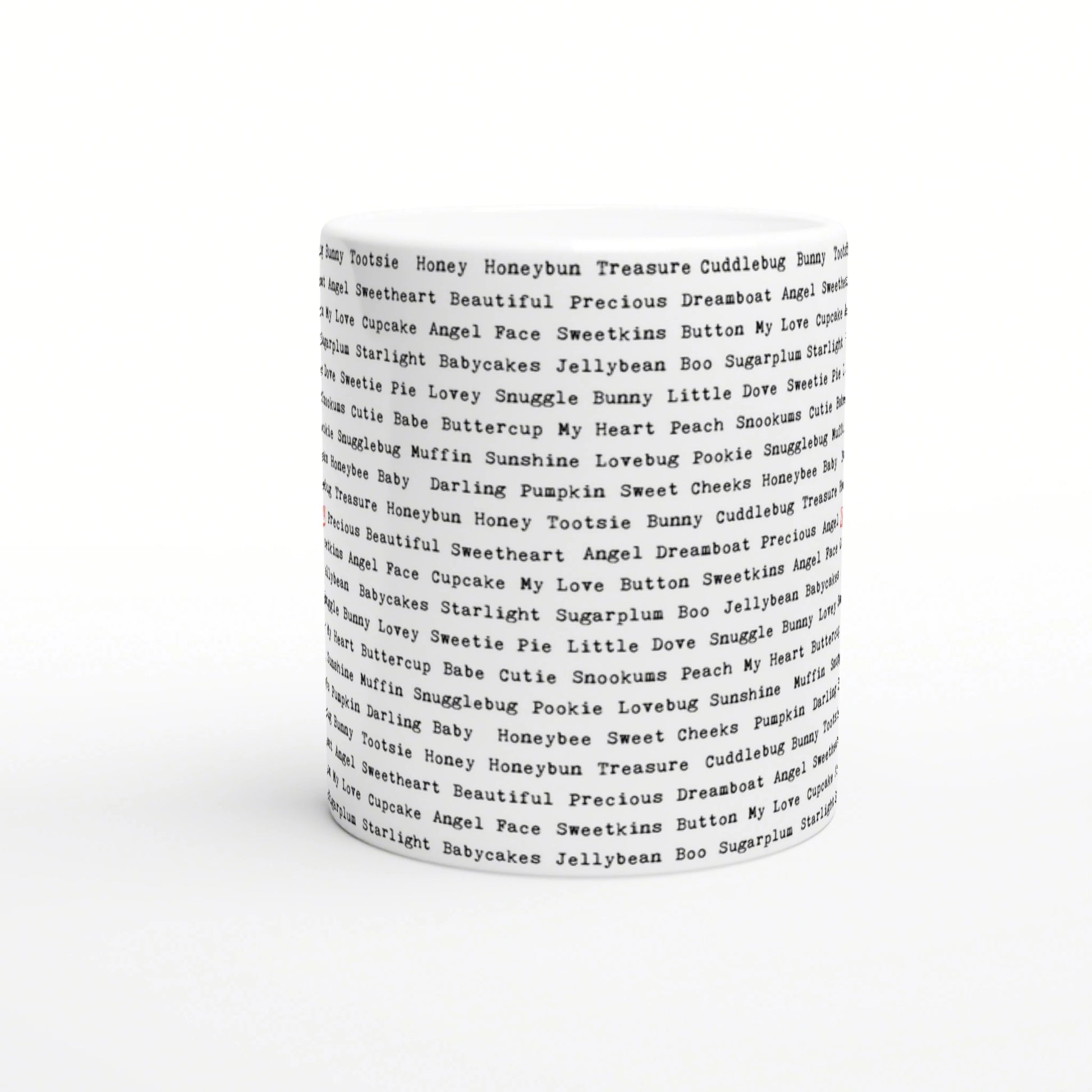 White ceramic mug with repeating black text phrases circling the surface; product mockup for humorous slogan cups.