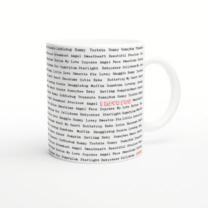 White ceramic mug with a repeating black word pattern and a central red 'I LOVE YOU' text; product mockup for slogan cups.