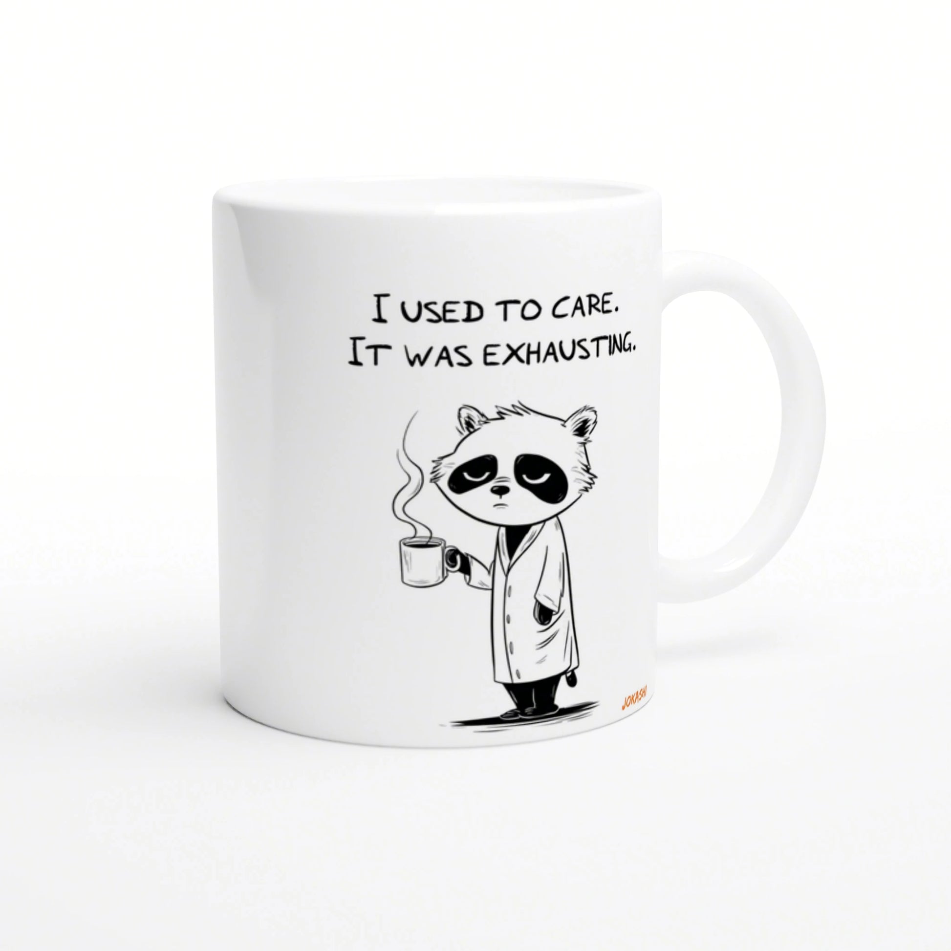 White mug featuring a tired panda in a lab coat, holding a steaming mug with the caption 'I used to care. It was exhausting.'