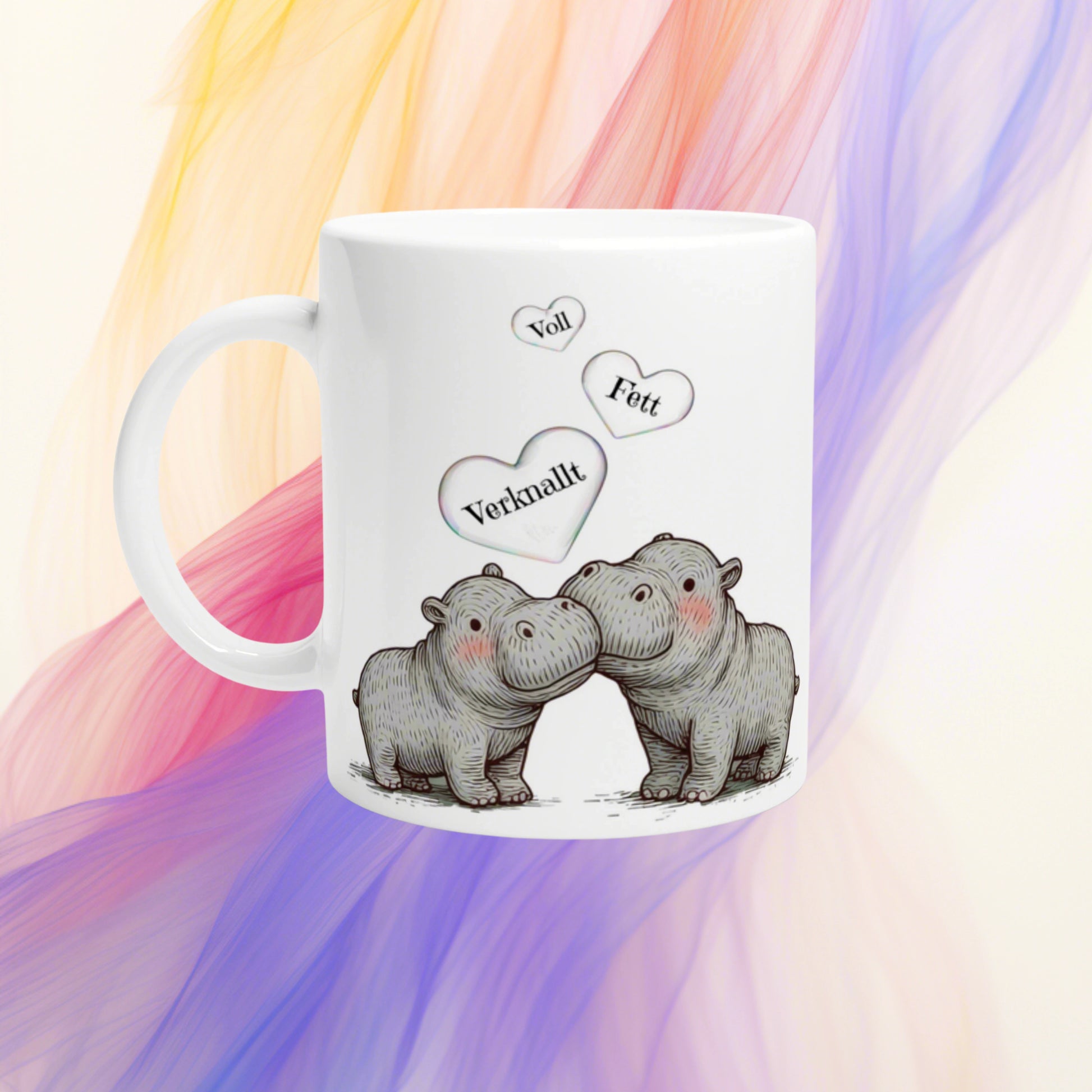 White mug mockup featuring two cuddling elephants and hearts with Voll, Fett, Verknallt; colorful abstract background.