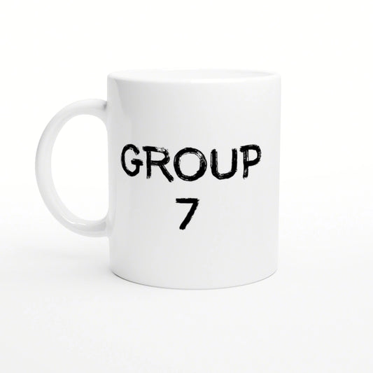 White ceramic mug featuring two-line black distressed text: 'GROUP' on top and '7' below, on a plain white studio background.