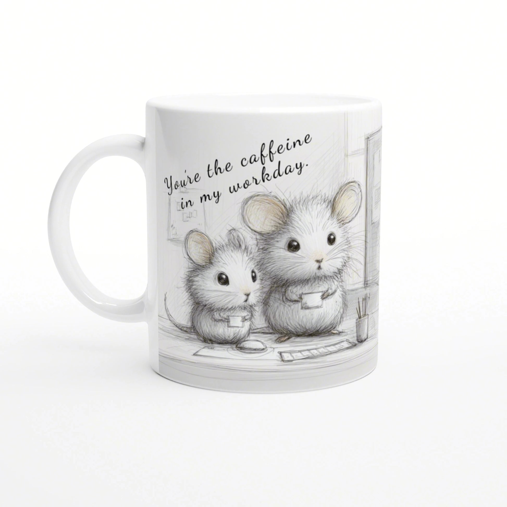 White mug with pencil drawing of two mice at a desk and the caption You're the caffeine in my workday.